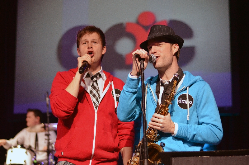 Denver Bierman singing with band